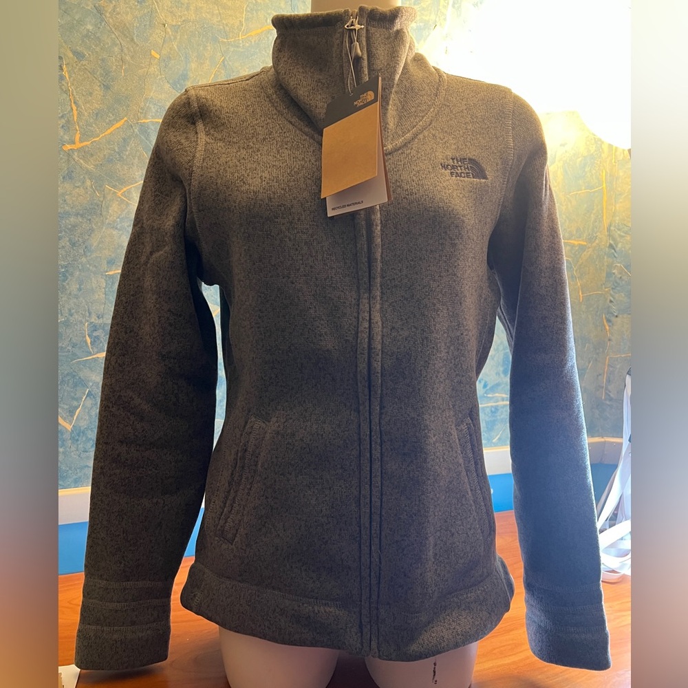 The north face fleece zip up sweater grey with black lettering